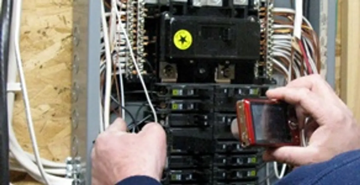 Home electrical inspection of circuit breaker panel by licensed electrician in Raleigh, NC