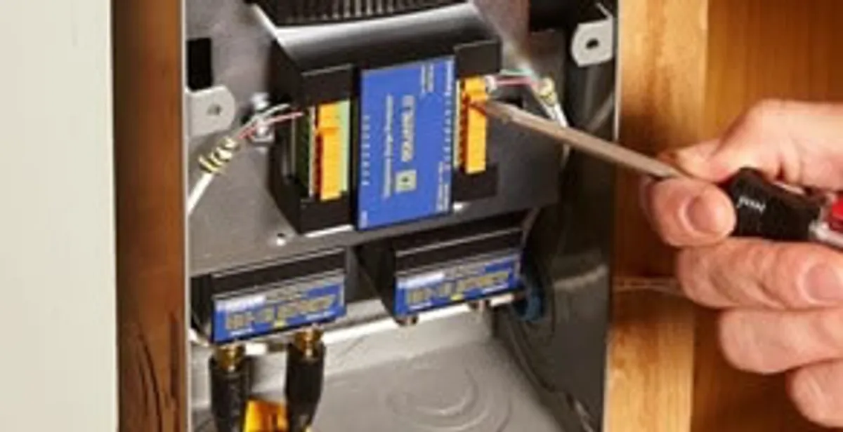 Whole home surge protection device being installed by a licensed electrician to protect electrical systems in Raleigh, NC