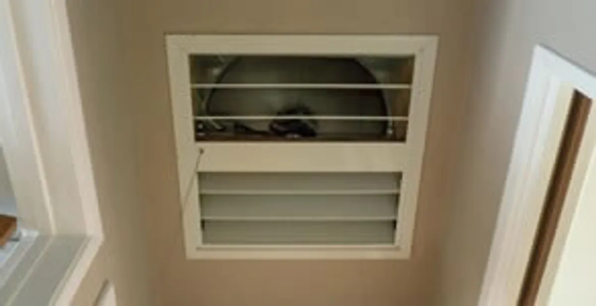 whole house fan installation services with ceiling-mounted ventilation system in Raleigh, NC